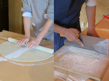 �������i